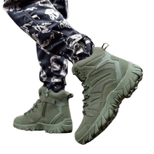 Load image into Gallery viewer, Green tactical boots worn with camouflage pants on a white background
