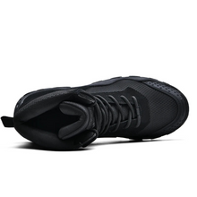 Load image into Gallery viewer, Black sneaker on a white background
